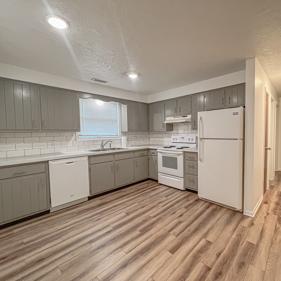 Remodeled kitchen with wooden floors